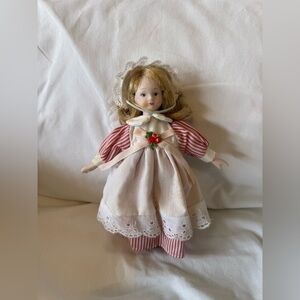 Vintage Porcelain Doll with Red and White Dress